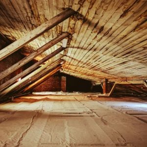 venting bathroom fan into attic