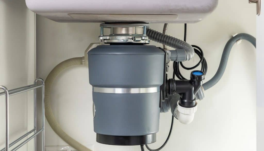 How To Reset, Fix, Or Replace Garbage Disposer (Can It Be Repaired?)
